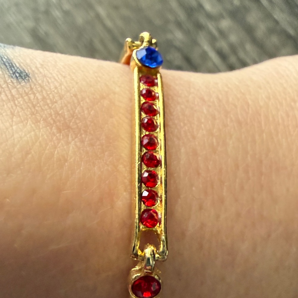 Elegant Gold Bracelet with Red, Blue, and White Accents - Picture 7 of 8